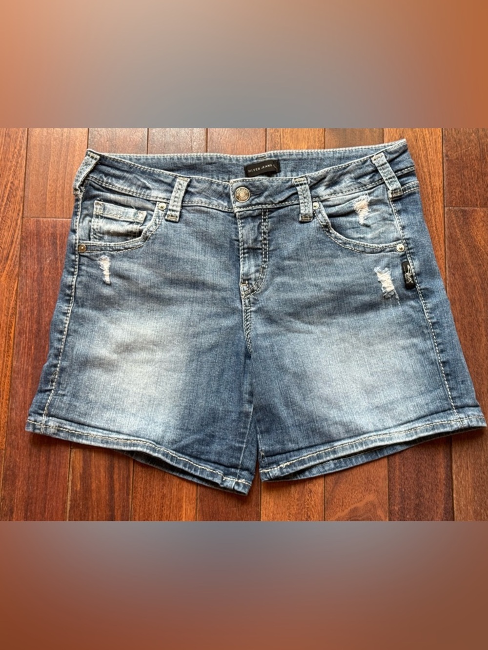 Silver Jeans Distressed Denim Shorts Size 30 with 4 1/2 inseam. Like new!